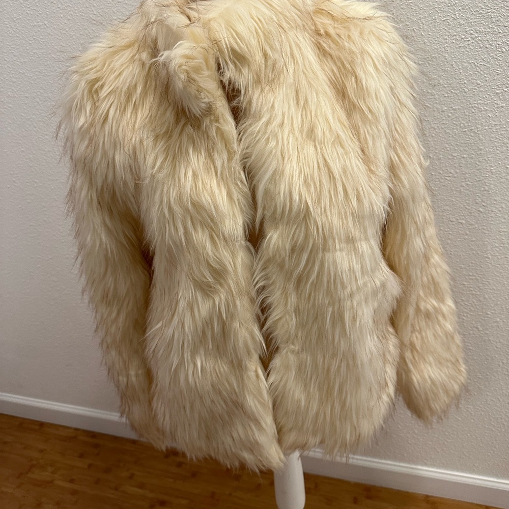 Women’s faux fur jacket. Great for holiday parties